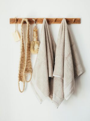 Set of body care tools with towels on hanger